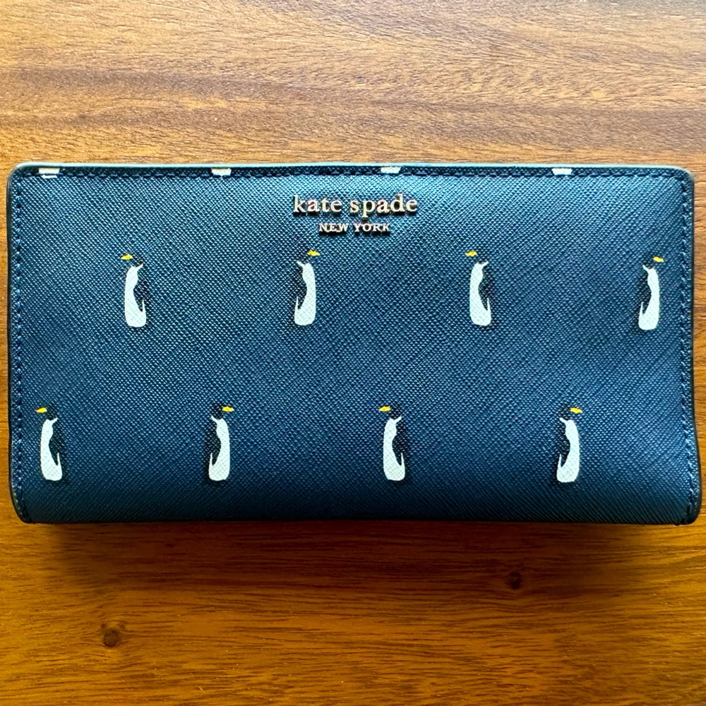 Kate space wallet with penguin motif